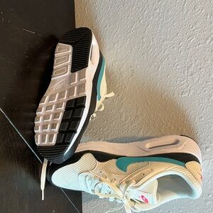 Women Nike Sneakers with Teal, Black, and White Size 9